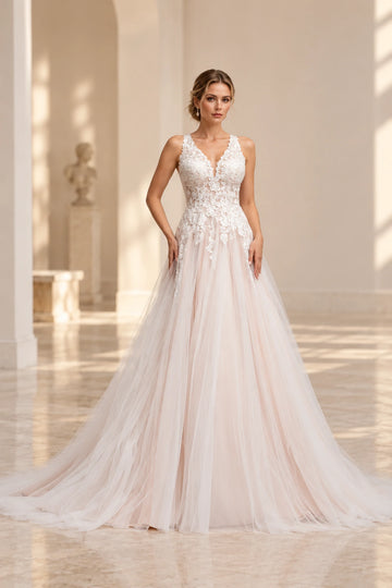 Vedress lace tulle A-line wedding dress with a plunging V-neckline, sleeveless floral straps, illusion bodice and floor-length skirt.
