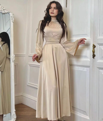 Champagne long sleeve mother of the bride dress with high neck and A-line skirt