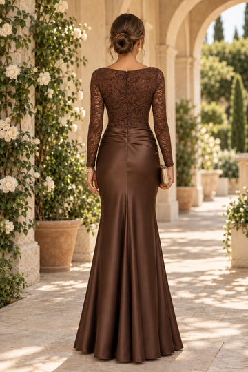 Back view of chocolate brown mother of the bride dress featuring floral lace covered back, center zipper, sheer long sleeves and fitted mermaid skirt