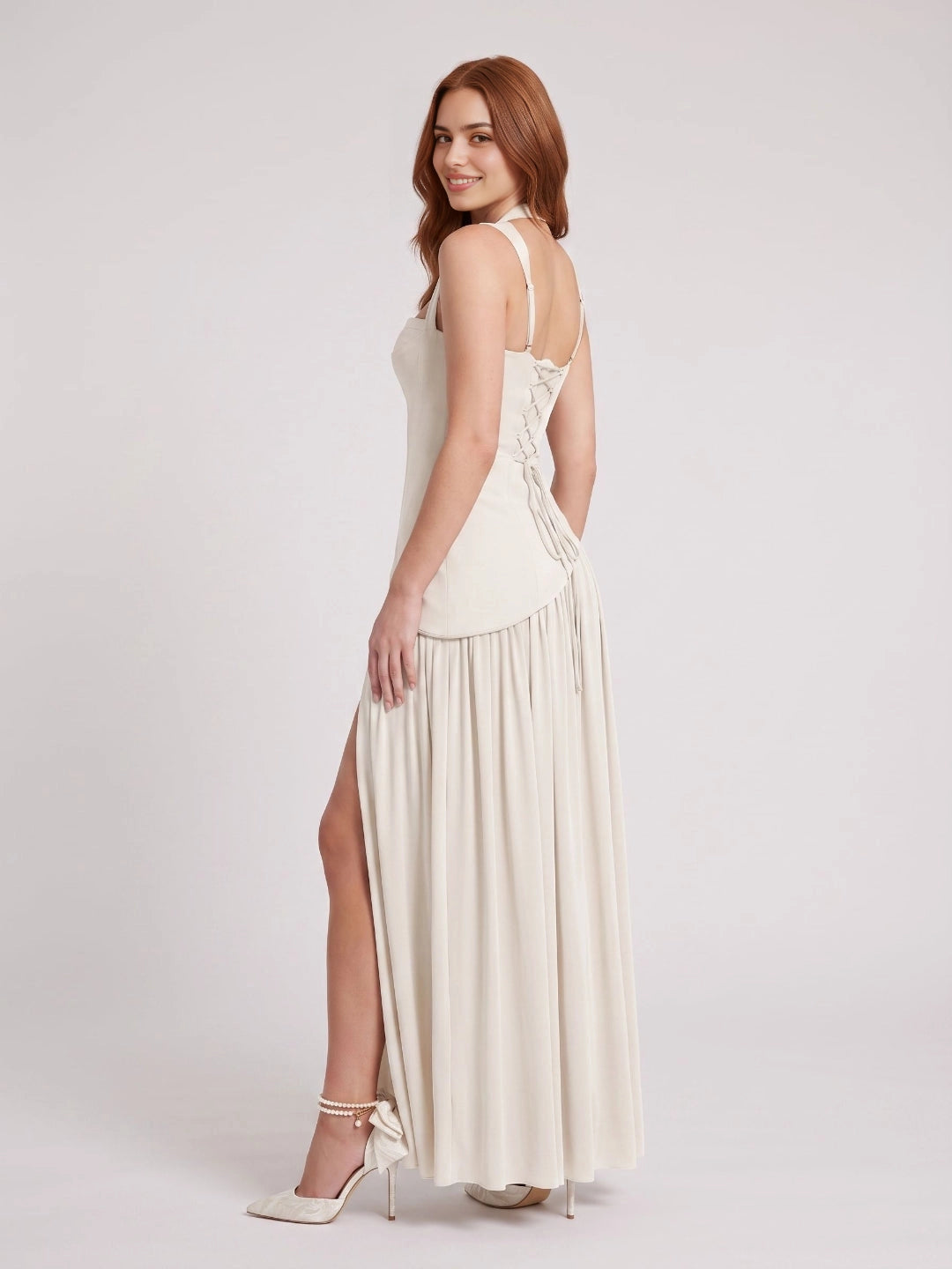 Cream a‑line long bridesmaid dress with halter neck structured corset bodice pleated high‑slit skirt lace‑up back from Vedress