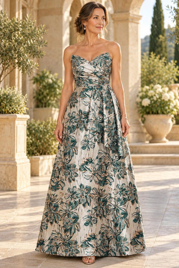 Dark green floral A-line mother of the bride dress featuring strapless sweetheart neckline, ruched bodice, draped waist detail and floor-length skirt, front view.