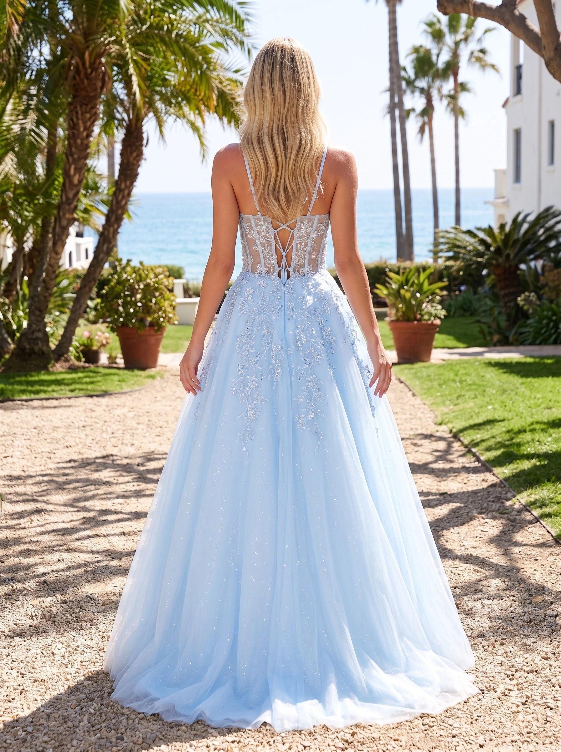 Back view of Vedress lace‑up corset wedding gown, thin spaghetti straps, sparkly full tulle skirt