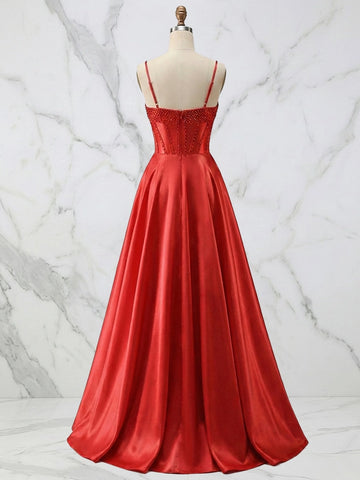 Red A-line prom dress with spaghetti straps and zipper back