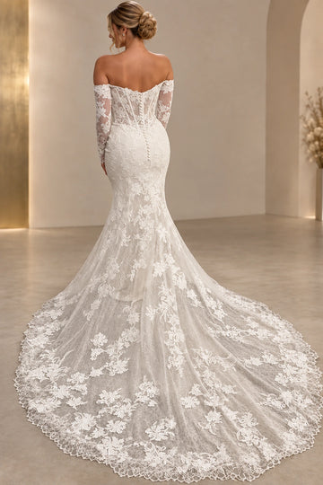 Back view of mermaid lace wedding dress with off-shoulder sleeves, covered buttons, and floral train
