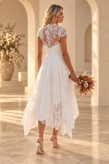 Back view of tea-length wedding dress with illusion lace back and scalloped hem