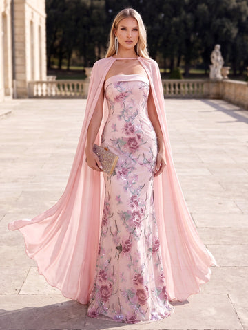 Vedress pink floral mermaid evening dress with a strapless neckline and flowing sheer cape, front view.