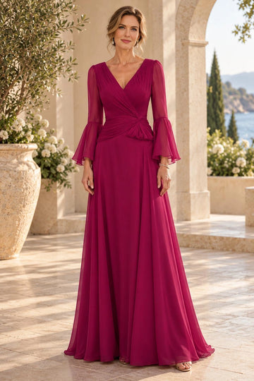 Fuchsia A-line mother of the bride dress featuring wrap V-neckline, sheer three-quarter bell sleeves, pleated bodice, ruched waist and floor-length skirt