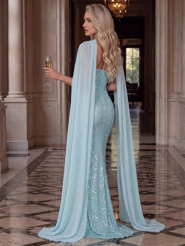 Ice blue sequin evening dress with strapless back and long flowing cape back view