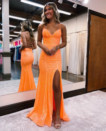 spaghetti strap sequin prom gown with a plunging neckline, fitted sheath silhouette, and high slit