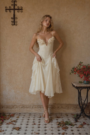 Vedress ivory A-line tea-length wedding guest dress with sweetheart neckline floral detail and spaghetti straps front view