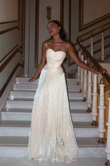 Ivory strapless sweetheart A-line floor length prom dress with shimmering skirt by Vedress