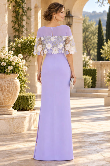 Lavender mother of the bride gown with sheer illusion back, keyhole opening, floral appliqué cape sleeves and fitted floor-length column skirt, back view.