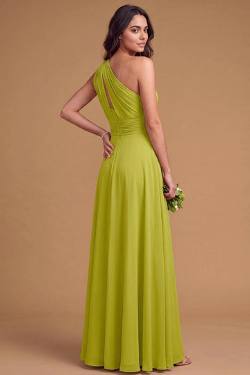 Back view of lime green bridesmaid dress featuring asymmetric shoulder draping, narrow back cutout, ruched waist, and flowing floor-length A-line skirt.