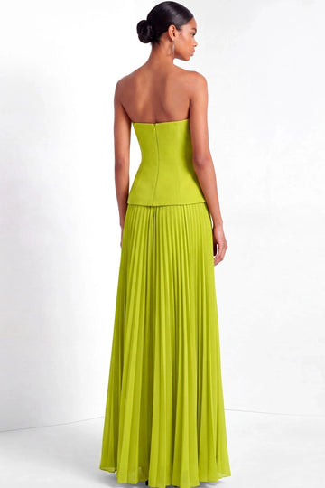 Back view of lime green strapless prom dress featuring a straight back neckline, center-back zipper, tailored bodice seams, and long pleated skirt.