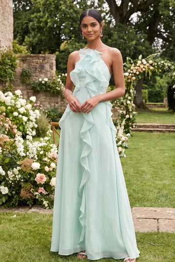 Mint green A-line bridesmaid dress with ruffled halter neckline, cascading front ruffles, fitted waist, and flowing floor-length skirt by Vedress.