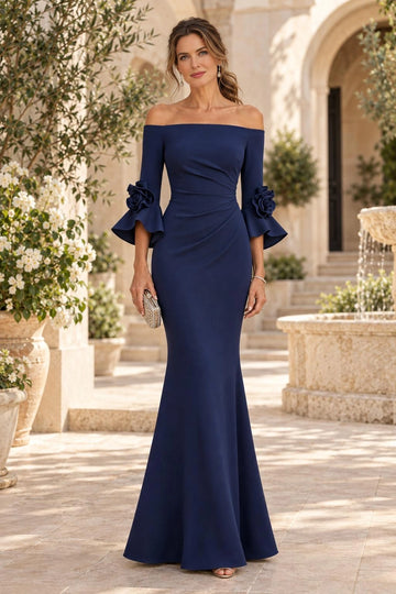 Navy blue mermaid mother of the bride dress with off-shoulder neckline, ruched bodice, three-quarter bell sleeves, 3D floral cuffs and floor-length skirt