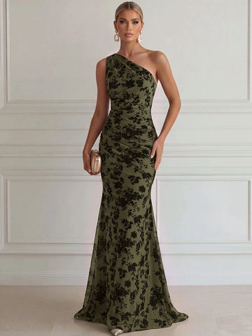 Olive green floral mermaid evening dress featuring black botanical pattern, one-shoulder neckline, asymmetrical ruched bodice and floor-length flared skirt, front view.