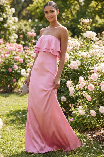 Pink strapless bridesmaid dress featuring a straight neckline, layered ruffle overlay, fitted sheath silhouette, and flowing maxi skirt by Vedress.