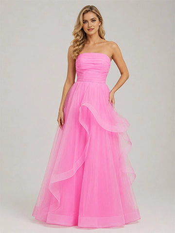 Pink strapless tulle ball gown prom dress with ruched bodice and cascading layers by Vedress