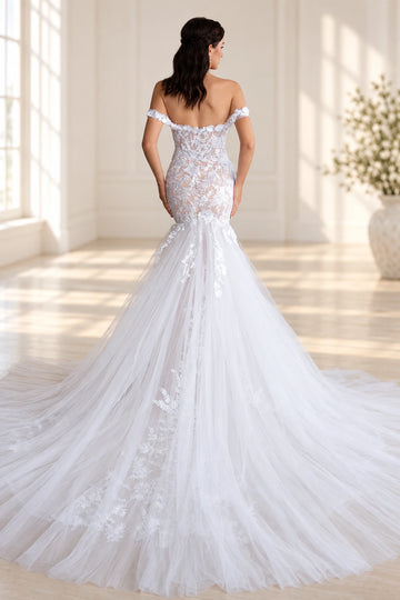 Back view of Vedress mermaid wedding dress showing a low open back, sheer-effect floral lace and a long layered train.