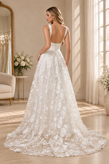 Vedress floral lace A-line wedding dress with a plunging V-neck, wide straps and a high leg slit, front view.