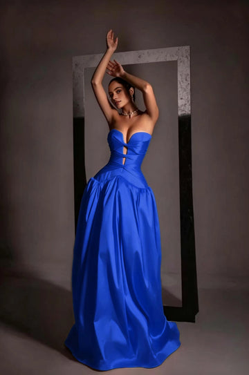 Royal blue strapless sweetheart prom dress with cutout bodice and full floor-length skirt