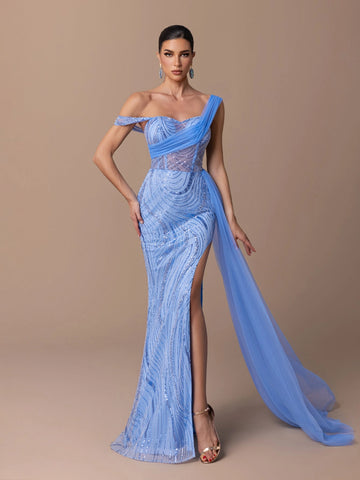 Blue sequin tulle mermaid prom dress with one shoulder neckline, sheer beaded corset bodice, thigh high slit and flowing tulle drape by Vedress