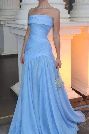 Sky blue strapless A-line prom dress featuring a straight neckline, diagonally ruched bodice, dropped waist and flowing floor-length skirt.