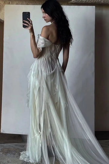 Soft sage open back maxi prom dress with flowing draped train