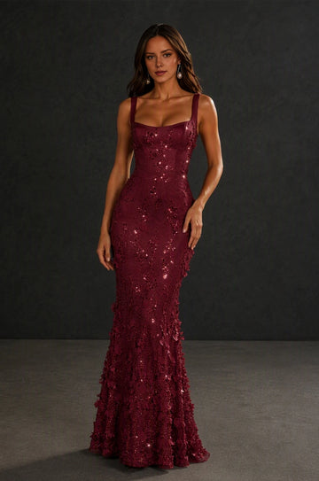 Vedress burgundy mermaid prom dress with a square neckline, sleeveless straps and sparkling floral appliqués, front view.