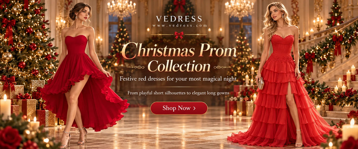 Two models wearing a red high-low prom dress and a long ruffled red gown in a luxurious Christmas ballroom for the Vedress holiday collection.