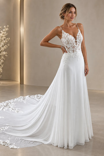 Front view of floral A-line lace wedding dress with V-neckline and spaghetti straps