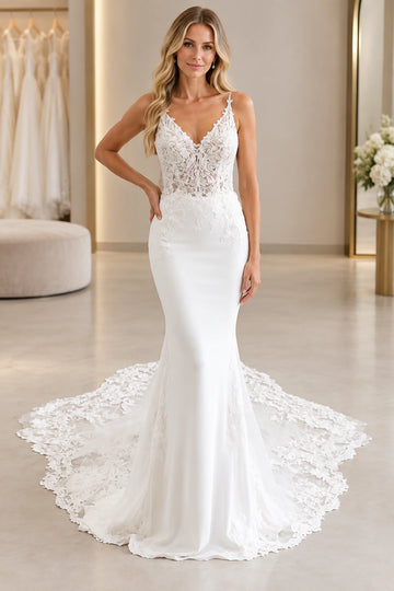 Front view of floral mermaid lace wedding dress with V-neckline and spaghetti straps