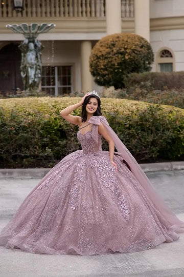 Vedress mauve ball gown quinceañera dress sweetheart one shoulder neckline glitter lace applique cape bow voluminous skirt front view