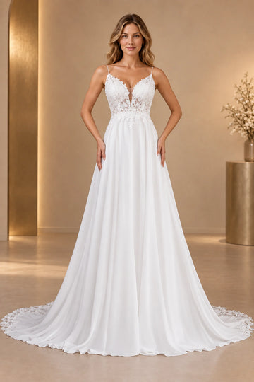 Vedress A-line wedding dress with a plunging V-neck, spaghetti straps, sheer floral lace bodice and flowing floor-length skirt.