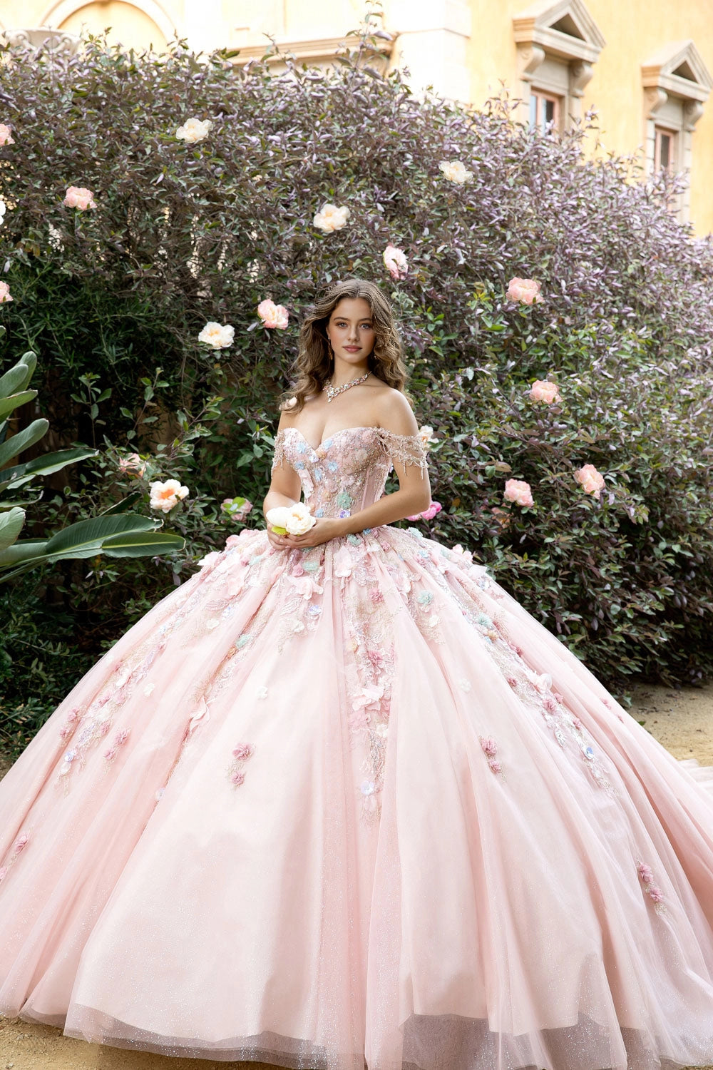 Vedress dreamy blush off‑shoulder sweetheart ball gown quinceanera prom dress front view with 3D floral appliques glitter tulle