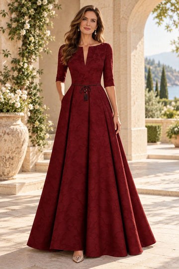 Wine A-line mother of the bride dress with tonal floral pattern, notch V-neckline, half sleeves, tassel waist detail and floor-length pleated skirt